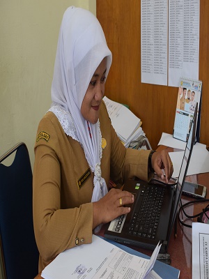 Rini Anggraini, SE